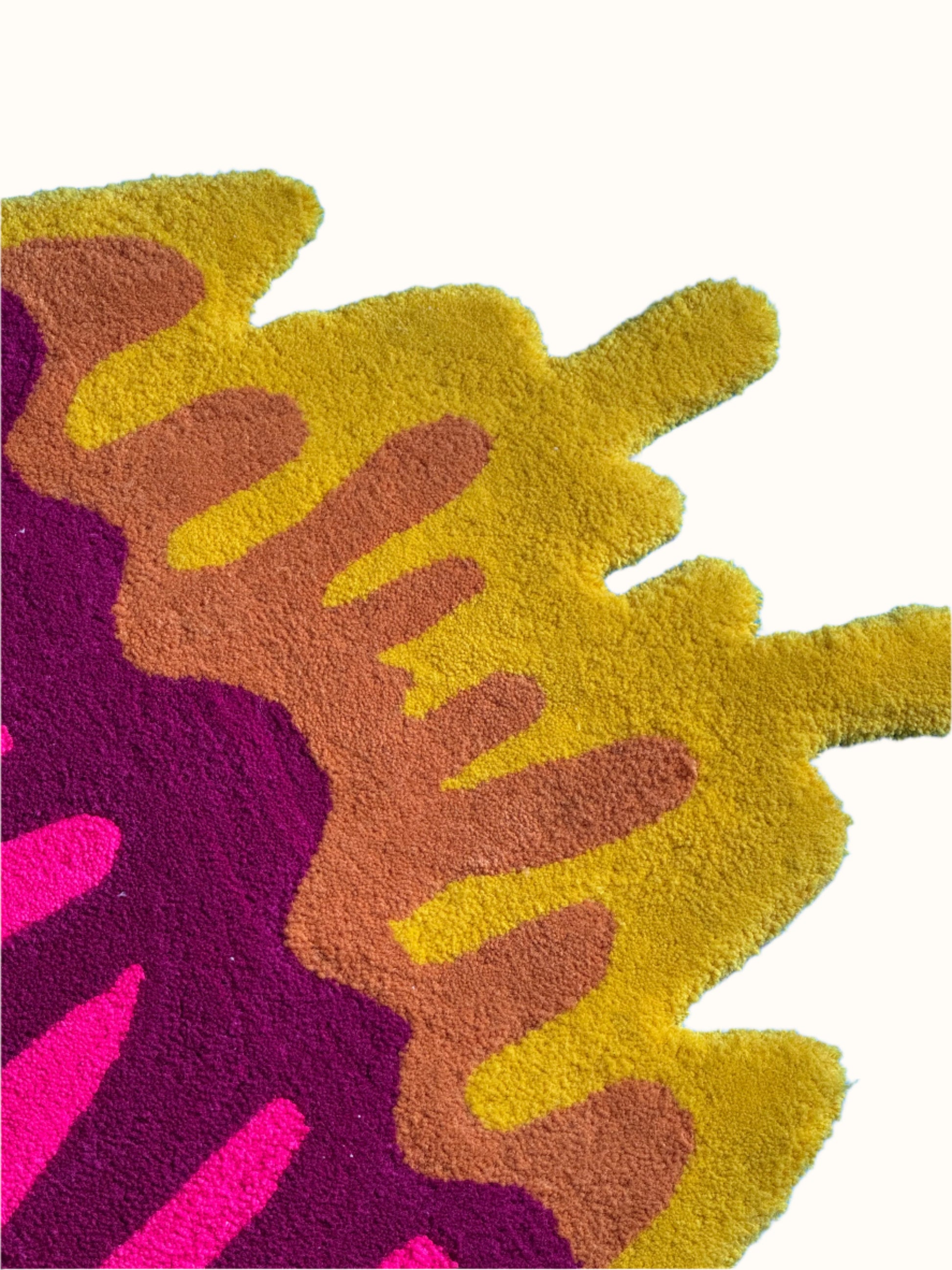 Close-up of a colorful rug with abstract patterns on a blue background